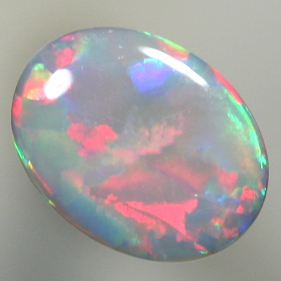 SOLID SEMI BLACK OPAL Rolling flashes of red and green turquoise 